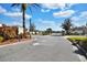 Community entrance with gate and landscaping at 4603 Cumbrian Lakes Dr, Kissimmee, FL 34746
