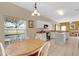 Kitchen breakfast nook with wood table and chairs at 4603 Cumbrian Lakes Dr, Kissimmee, FL 34746