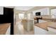 Bright kitchen featuring an island and stainless steel appliances at 4603 Cumbrian Lakes Dr, Kissimmee, FL 34746
