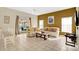 Living room with light beige walls and tiled floors at 4603 Cumbrian Lakes Dr, Kissimmee, FL 34746