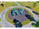 Overhead view of a playground with green slides and play structures at 4603 Cumbrian Lakes Dr, Kissimmee, FL 34746