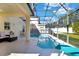 Screened pool and patio with lounge chairs at 4603 Cumbrian Lakes Dr, Kissimmee, FL 34746