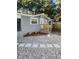 Gray house exterior with small front yard and stone pathway at 5413 Vanderlin St, Orlando, FL 32810