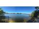 Scenic view of a peaceful lake with clear water at 5804 Defiance Ave, Orlando, FL 32839