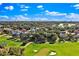 Home in a golf course community with beautiful landscaping at 6018 Tarawood Dr, Orlando, FL 32819