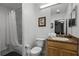 Clean bathroom with single sink vanity and bathtub at 9051 Treasure Trove Ln # 207, Kissimmee, FL 34747