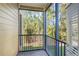 Cozy screened porch with wooded views at 9051 Treasure Trove Ln # 207, Kissimmee, FL 34747