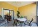 Spacious screened porch with seating area at 9051 Treasure Trove Ln # 207, Kissimmee, FL 34747