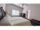 Bright bedroom with double bed, dresser, and bookcase at 9536 Muse Pl, Orlando, FL 32829