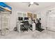 Bright home office features a workspace and exercise area at 119 Candlewick Rd, Altamonte Springs, FL 32714