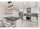 Modern kitchen with stainless steel appliances and an island with seating at 119 Candlewick Rd, Altamonte Springs, FL 32714