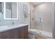 Modern bathroom with a glass shower, updated vanity, and LED mirror at 17114 Blessing Dr, Clermont, FL 34714