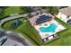 Community pool and playground with solar panels at 17114 Blessing Dr, Clermont, FL 34714