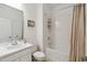 Clean bathroom with tub shower combo and updated vanity at 1880 Goblet Cove St, Kissimmee, FL 34746