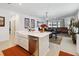 Modern kitchen with white cabinets, stainless steel appliances, and an island at 1880 Goblet Cove St, Kissimmee, FL 34746