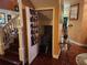 Storage space under the stairs with shelving at 2606 Royal Fern Pl, Kissimmee, FL 34758