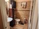 Clean bathroom with tile floors and updated vanity at 2606 Royal Fern Pl, Kissimmee, FL 34758