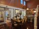 Bright dining room with kitchen access and staircase view at 2606 Royal Fern Pl, Kissimmee, FL 34758