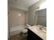 Bathroom with tub, toilet, and vanity sink at 5231 Via Hacienda Cir # 117, Orlando, FL 32839