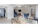 Open concept kitchen and living area with granite island at 557 Dove Ct, Kissimmee, FL 34759