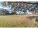 Community playground with play structures and shaded area at 557 Dove Ct, Kissimmee, FL 34759