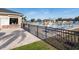 Community pool with surrounding patio and fence at 557 Dove Ct, Kissimmee, FL 34759
