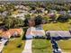 Bird's eye view of the house and surrounding neighborhood at 607 Tamarin Ln, Kissimmee, FL 34759