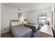 Guest bedroom with two twin beds at 607 Tamarin Ln, Kissimmee, FL 34759