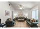 Cozy living room with two sofas and a coffee table at 607 Tamarin Ln, Kissimmee, FL 34759
