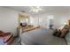 Main bedroom with king-size bed and built-in TV at 607 Tamarin Ln, Kissimmee, FL 34759