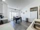 Bright dining area with table and chairs near kitchen at 644 Bent Oak Loop, Davenport, FL 33837