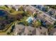 Aerial view of community pool and surrounding buildings at 8711 Rockingham Ter # C, Kissimmee, FL 34747