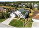 Aerial view of a house with a two car garage and neighborhood view at 905 Durango Loop St, Davenport, FL 33897