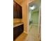 Convenient laundry room with washer, dryer, and cabinets at 9094 Outlook Rock Trl, Windermere, FL 34786