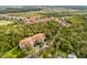 Aerial perspective showcasing the community and surrounding nature at 1301 Tuscan Ter # 9107, Davenport, FL 33896