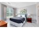 Bedroom with dark blue bedding and teal headboard at 1301 Tuscan Ter # 9107, Davenport, FL 33896