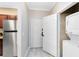 Stackable washer and dryer in small laundry closet at 1301 Tuscan Ter # 9107, Davenport, FL 33896