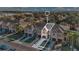 Aerial view of townhome community, highlighting a two-story townhome with attached garage at 1336 Chelsea Dr, Davenport, FL 33897