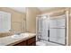 Clean bathroom with shower/tub combo and wood vanity at 1336 Chelsea Dr, Davenport, FL 33897