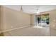 Bright dining area with tile floors and sliding glass doors leading to patio at 1336 Chelsea Dr, Davenport, FL 33897