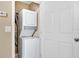 Stackable washer and dryer in a closet at 1336 Chelsea Dr, Davenport, FL 33897