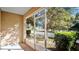 Screened-in porch overlooking backyard at 1336 Chelsea Dr, Davenport, FL 33897