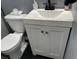 Simple bathroom with white vanity and toilet at 1615 Jefferson Dr, Mount Dora, FL 32757