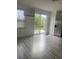 Kitchen with stainless steel appliances and backyard access at 2857 Lyndscape St, Orlando, FL 32833