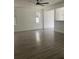 Bright living room with hardwood floors and ceiling fan at 2857 Lyndscape St, Orlando, FL 32833