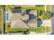 Aerial view of house and backyard pool at 3571 Maple Ridge Loop, Kissimmee, FL 34741