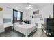 Charming bedroom with white bedding and a Marvel poster at 3571 Maple Ridge Loop, Kissimmee, FL 34741