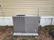 Older Carrier air conditioning unit at 4914 Dove Ln, Auburndale, FL 33823