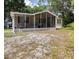 Mobile home with covered porch and large yard at 4914 Dove Ln, Auburndale, FL 33823