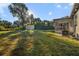 Large backyard with shed and screened porch at 527 Sunrise Dr, Orlando, FL 32803